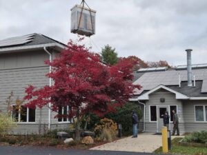 Crane putting in new equipment